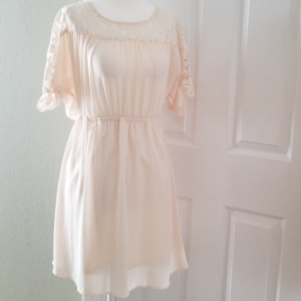 Cream lace dress with pearl button detail
